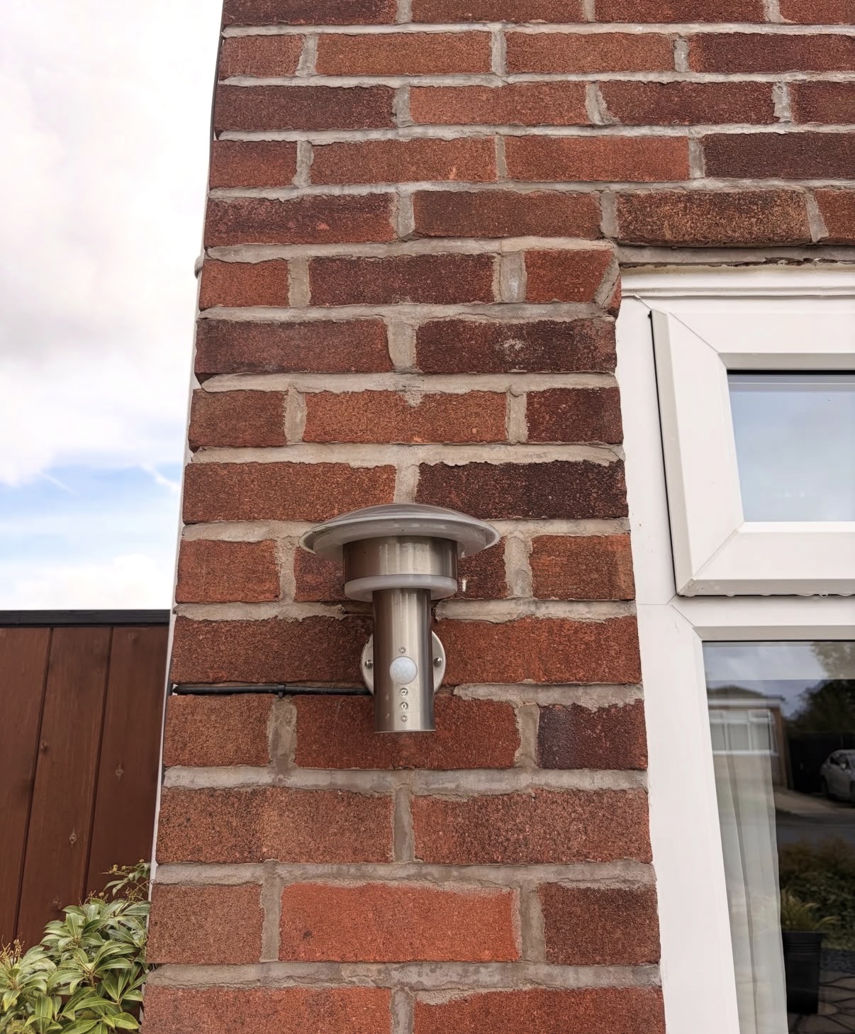 Outdoor wall light installation by Parallel Property Services